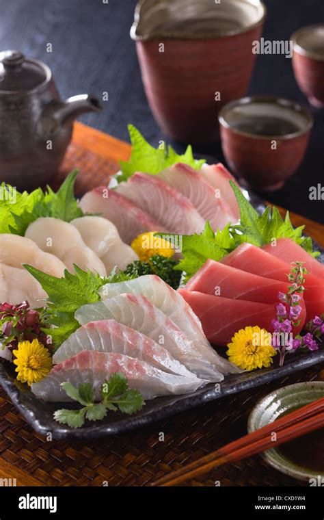 Four Assorted Sashimi Lean Tuna Sea Bream Scallop And Greater