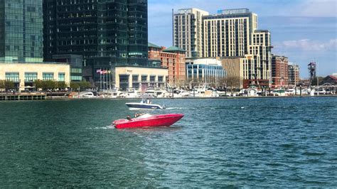 Red Boat In Harbor East R Baltimore