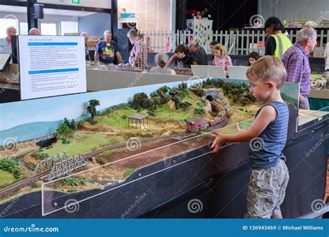A Young Boy Watching A Train At A Model Railway Show Editorial Stock