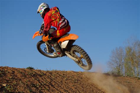 Dirt Biker Jumping Off A Hill Image Free Stock Photo Public Domain