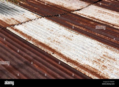 Rusted Corrugated Metal Roof Sheets In Various Shades Of Brown Stock