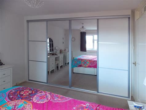 Fitted wardrobes, sliding doors and interiors. Fitted White Aluminium Mirrored Sliding Wardrobe: Peter ...