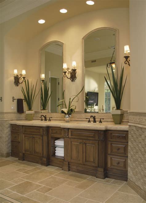 Have a double sink vanity with a single mirror above. Rise And Shine! Bathroom Vanity Lighting Tips