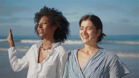 Closeup Of Carefree Young Girls Making Funny Faces And Smiling For