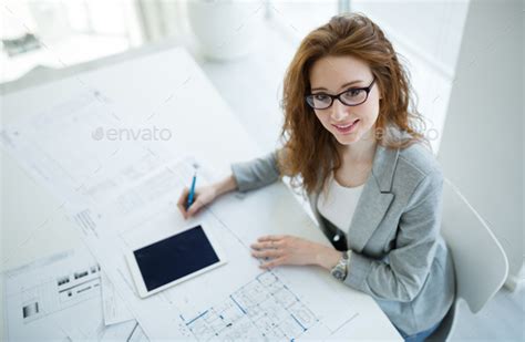 Beautiful Female Architect Working On Plan Stock Photo By Nd3000