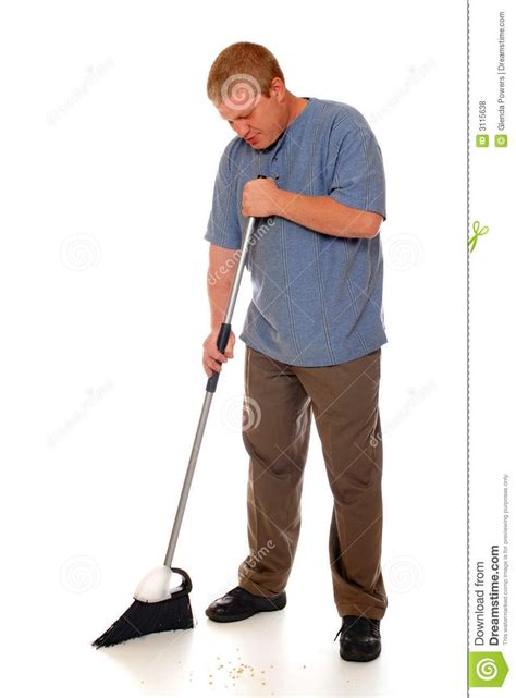 Cleaning Up Man Sweeping The Floor With A Domestic Broom Isolated On