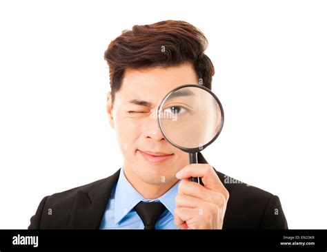 Businessman Looking Through Magnifying Glass Stock Photo Alamy