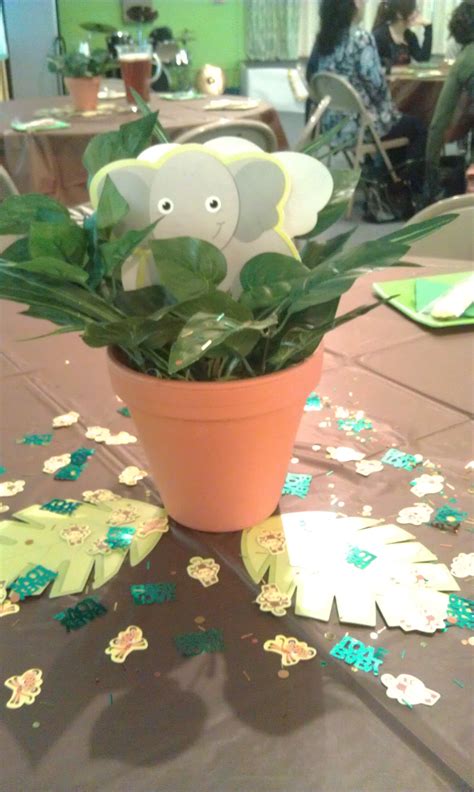 There are many safari baby shower decorations. Jungle Baby Shower Table Decoration | Baby shower table decorations, Jungle baby shower, Jungle ...
