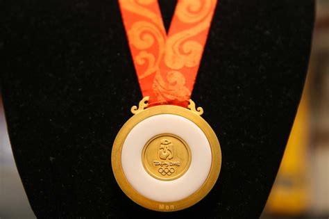 Beijing 2022 Celebrates Hosting Summer And Winter Olympics In Medal Design