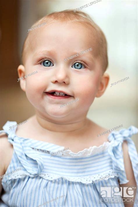 Close Up Of A Baby Girl Smiling Stock Photo Picture And Royalty Free