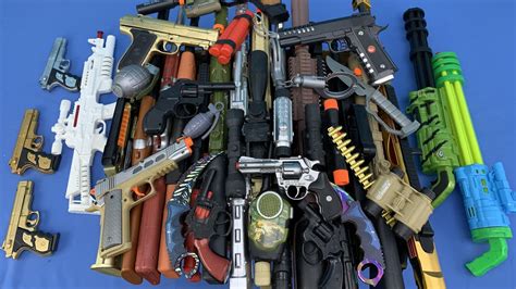 Dozens Of Toy Rifles Realistic Toy Pistols Colorful Weapons Capguns