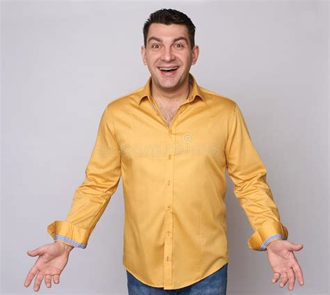 Cheerful Guy In Yellow Shirt Isolated Stock Image Image Of