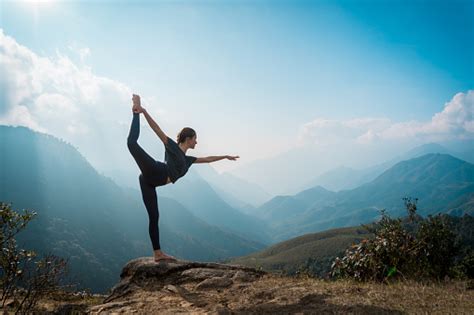 Woman Training Yoga Mountains On Background Stock Photo Download