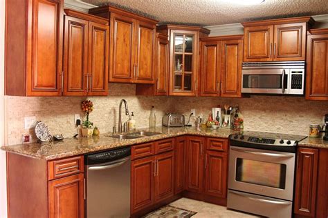 So if your kitchen floor has sheets of italian marble or glittery tiles, don't hesitate to go for maple shaker cabinets because the light wood finish works well with all types of kitchen interiors. Honey Maple Kitchen Cabinets | A Creative Mom