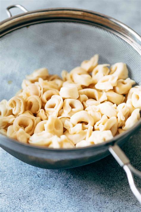 This potluck favorite is packed with cheeses, meats, olives, peppers, and more for a hearty italian summer side dish. Italian Antipasto Tortellini Pasta Salad - Easy, Make ...