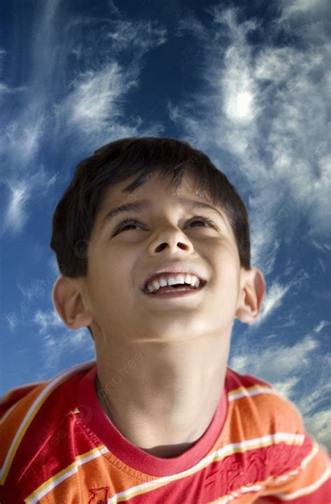 Boy Looking Up Child Kid Photo Background And Picture For Free Download