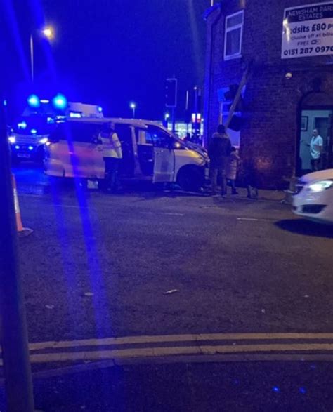 Car Crashes Into Building After Hitting Another Vehicle On Busy City