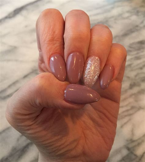 Modified stiletto almond nails in my nightly craving gelish Almond