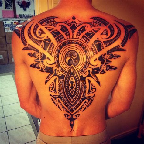 my new back everything gets a return full back yin yang polynesian and celtic tattoo