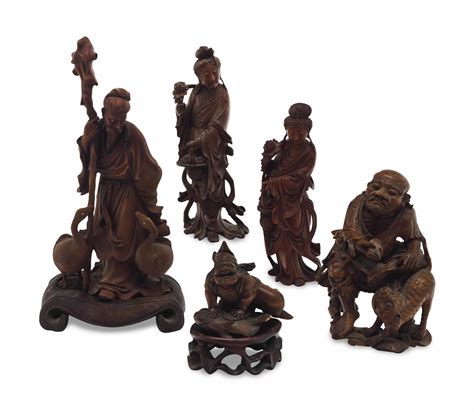 Four Chinese Carved Wood Figures Christies