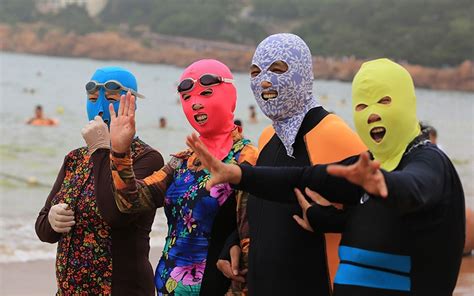 Are You Beach Ready Chinas Facekini Craze In Pictures