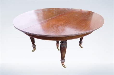 Looked for a round extending pedestal table for months without success then found this one which fits all our needs. Round Extending Antique Dining Room Table 12ft Long From ...