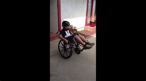 Kid In Wheelchair Falls Backwards Youtube