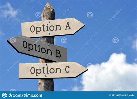 Option A B Or C Wooden Signpost With Three Arrows Stock Photo