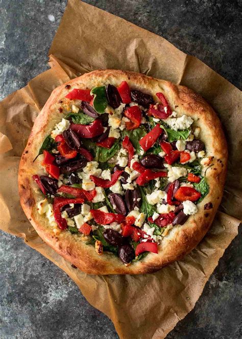Greek Pizza With Feta Spinach And Olives Inquiring Chef