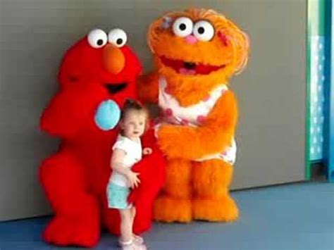 I'm curious to see how much zoe is played. My daughter getting her picture taken with Elmo and Zoe - YouTube