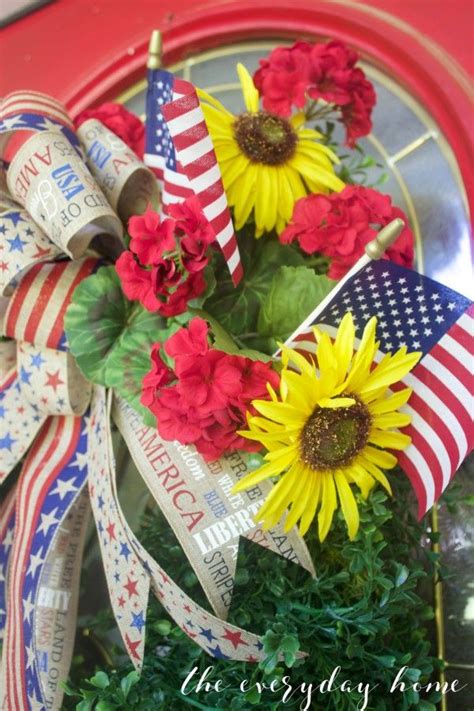 Patriotic Wreath With Sunflowers And Red White And Blue Flowers In It