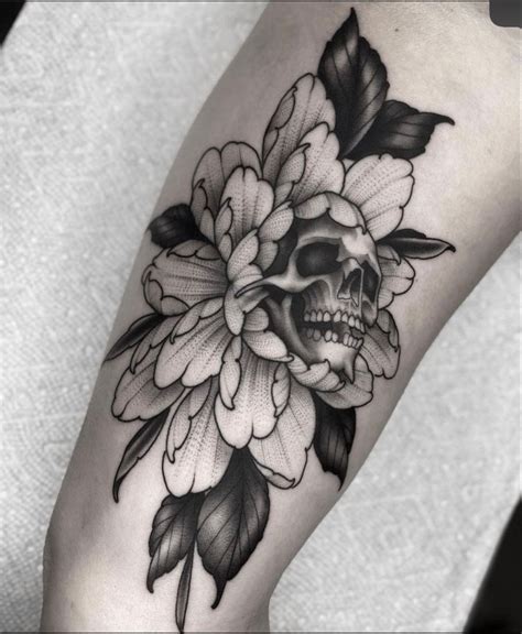 Skull And Flower Tattoo With Leaves