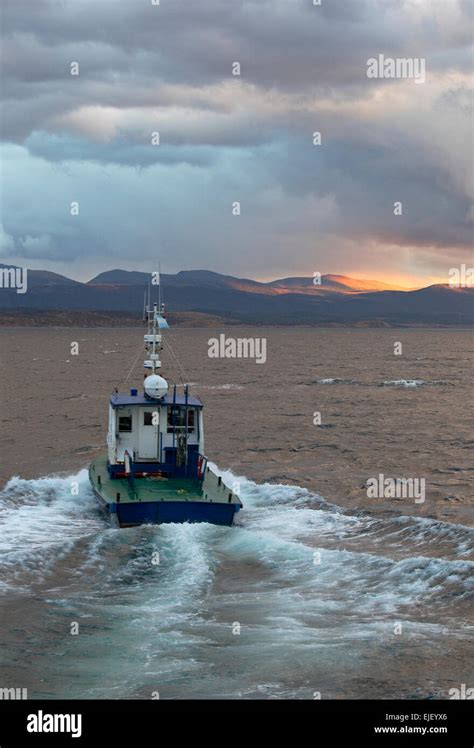 Vessel Drives Off Into The Sunset In The Beagle Channel Terra Del