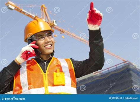 Construction Worker With Crane In Background Stock Photo Image Of