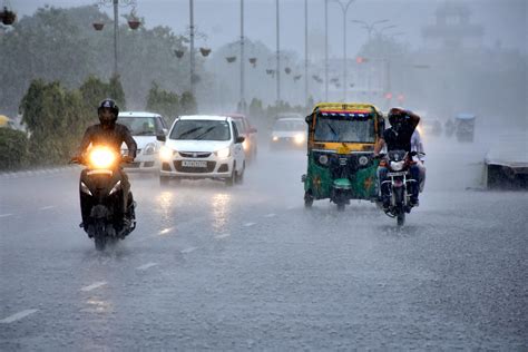 Photos Cities Across India Brave Heavy Rain Traffic Snarls And
