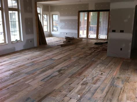 My church likes to change things up from time to time, so we didn't want to make this reclaimed wood wall a permanent feature in their space. Reclaimed+Barnwood+Flooring+Rustic+Flooring+by+jimellison ...