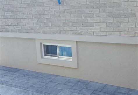 Sand Finish Example On Foundation Wall In An Acrylic Stucco Cinder