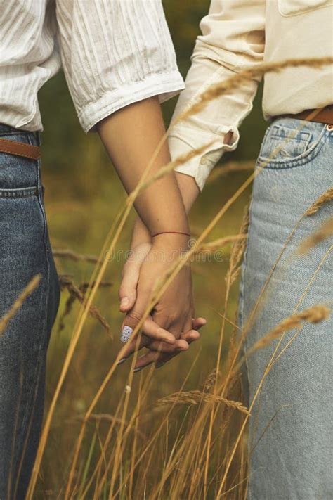 Same Sex Love Of Girls Girls Hold Hands During Quarantine Stock Image