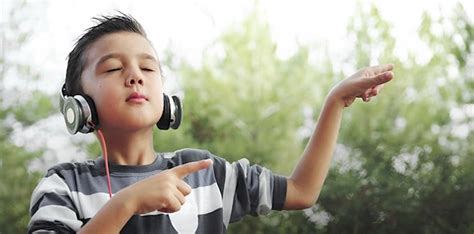 Image Of Boy Listening To Music V2 658x325