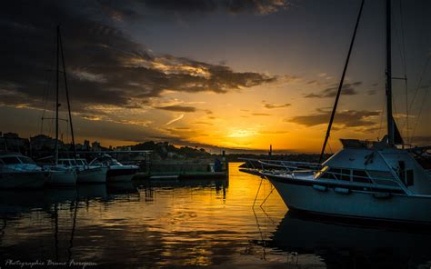 Hintergrundbilder Sonnenlicht Boot Sonnenuntergang Meer Bucht
