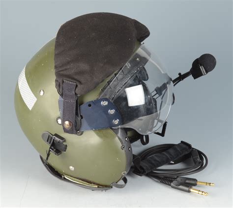 A Pilots Flying Helmet With Leather Inner And Built In Headphones