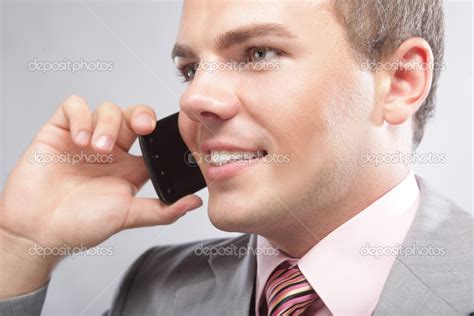 Young Business Man Making A Phone Call — Stock Photo © Juiceteam 32724963