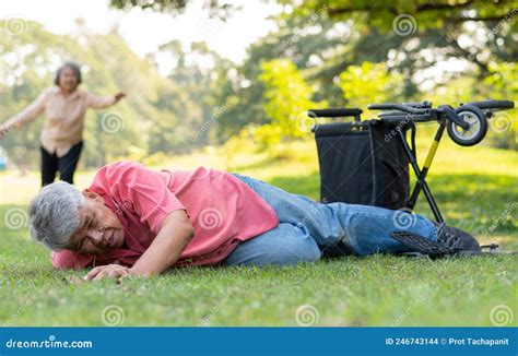 Asian Senior Man Falling Down From Wheelchair On Lying Floor After