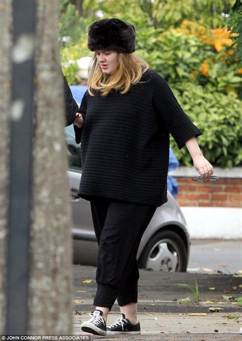 A Heavily Pregnant Adele Sticks To Her Favourite Colour Black As She