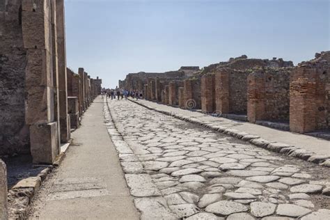 The City Of Pompeii Buried Under A Layer Of Ash By The Volcano Mount