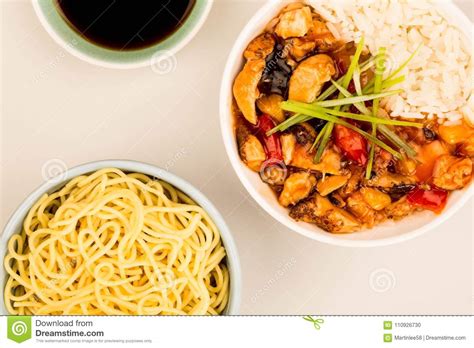 Cantonese style sweet and sour chicken with rice against a green background. Cantonese Style Sweet And Sour Chicken With Rice Stock ...