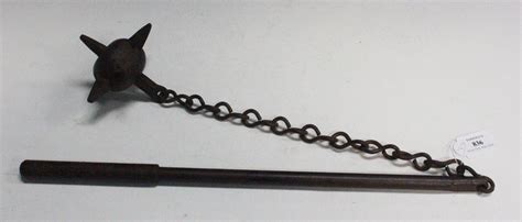 A 20th Century Cast Iron Flail Of Morning Star Form The Six Pointed