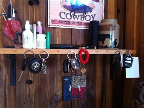Easy shelf for keys and stuff. Pine board with metal shelf brackets