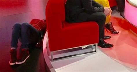 bbc breakfast floor manager tries to hide behind sofa on live tv but hilariously forgets one