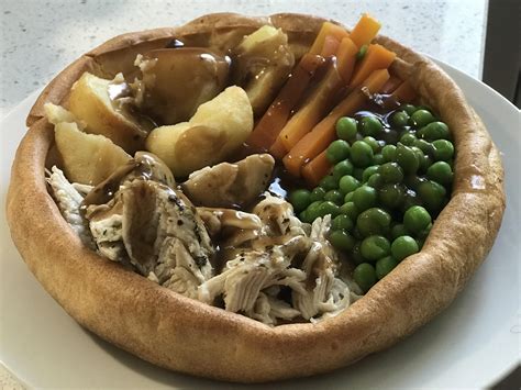 Homemade Giant Yorkshire Pudding Holding A Lazy Roast Rfood